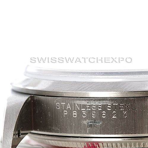 This image shows a close-up of the side of the Rolex Air-King 14000 Men's Stainless Steel Blue Dial 14000 Men's Stainless Steel Blue Dial watch, displaying the serial number and "STAINLESS STEEL" engraving.