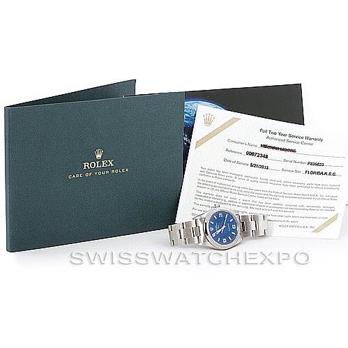 The image shows a Rolex Air-King 14000 Men's Stainless Steel Blue Dial 14000 Men's Stainless Steel Blue Dial watch with a blue dial, bracelet, warranty card, and official Rolex booklet from a straight-on angle.