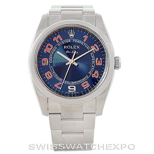 The image shows a front view of a Rolex Air-King 114200 Men's Stainless Steel Blue Dial 114200 Men's Stainless Steel Blue Dial watch, featuring a blue dial with red numerals, silver bracelet, and crown at the 3 o'clock position.