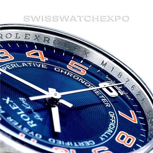 This image shows a close-up angle of the dial, hands, and partial bezel of the Rolex Air-King 114200 Men's Stainless Steel Blue Dial 114200 Men's Stainless Steel Blue Dial watch.