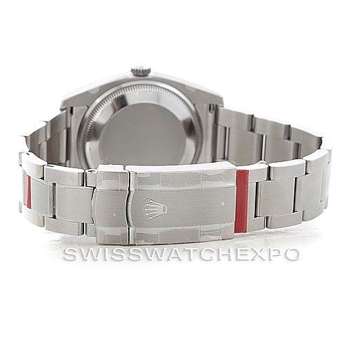 The image shows the rear view of a Rolex Air-King 114200 Men's Stainless Steel Silver Dial 114200 Men's Stainless Steel Silver Dial watch, highlighting the closed clasp and stainless steel bracelet.