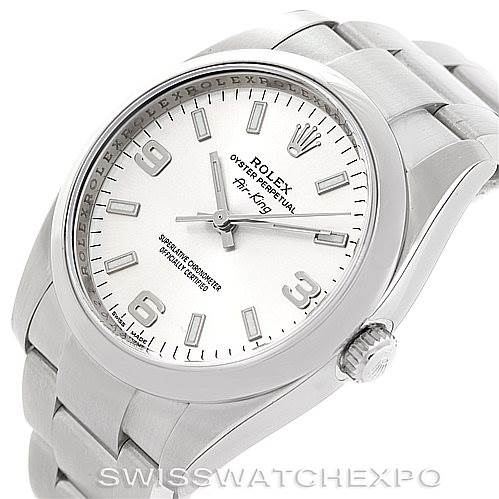 The image shows a Rolex Air-King 114200 Men's Stainless Steel Silver Dial 114200 Men's Stainless Steel Silver Dial watch at a tilted angle, featuring the dial, bezel, crown, and part of the bracelet.
