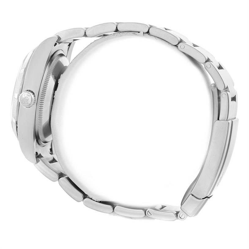 The image shows a side view of a Rolex Air-King 114210 Men's Stainless Steel White Dial 114210 Men's Stainless Steel White Dial watch, highlighting its crown, bezel, case, and bracelet.