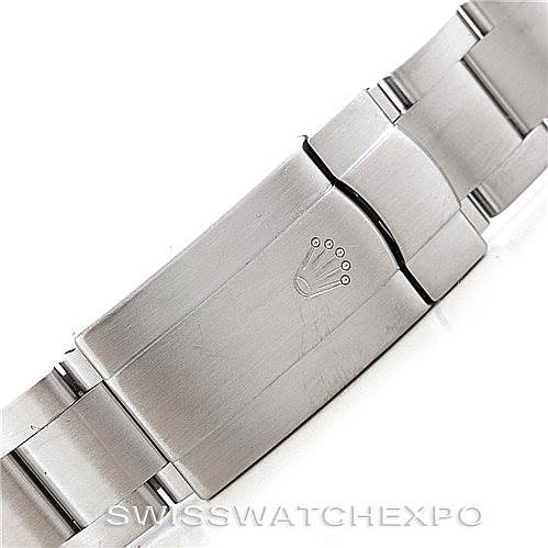 This image shows a close-up view of the clasp and part of the stainless steel bracelet of a Rolex Air-King 114210 Men's Stainless Steel White Dial 114210 Men's Stainless Steel White Dial watch.