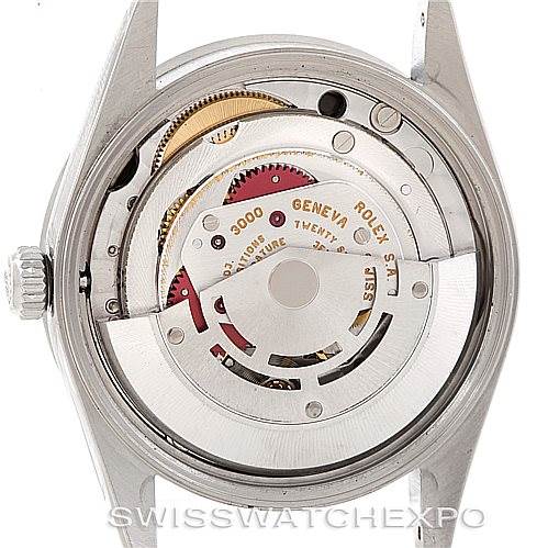 The image shows the movement mechanism of a Rolex Air-King 14010 Men's Stainless Steel Black Dial 14010 Men's Stainless Steel Black Dial watch from the back, revealing the intricate internal components.