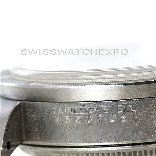 This image shows a close-up of the side of a Rolex Air-King 14010 Men's Stainless Steel Silver Dial 14010 Men's Stainless Steel Silver Dial watch, focusing on the stainless steel case and part of the bezel.