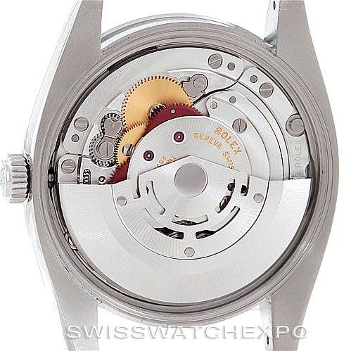 This image shows the movement and inner mechanism of the Rolex Air-King 114200 Men's Stainless Steel Blue Dial 114200 Men's Stainless Steel Blue Dial watch from a back angle, with the case back removed.