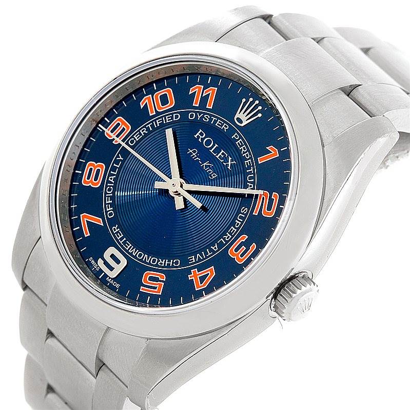 This image shows a Rolex Air-King 114200 Men's Stainless Steel Blue Dial 114200 Men's Stainless Steel Blue Dial watch at a slight side angle, highlighting the face, bezel, and part of the bracelet.
