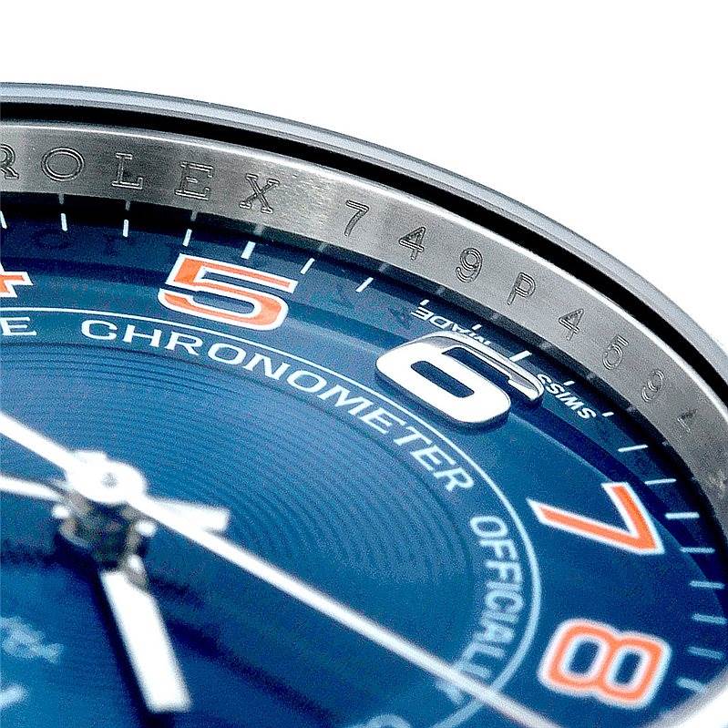 The image shows a close-up angle of the Rolex Air-King 114200 Men's Stainless Steel Blue Dial 114200 Men's Stainless Steel Blue Dial model, focusing on its dial, numerals, and part of the bezel.