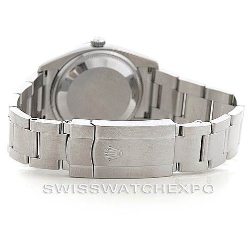 This Rolex Air-King 114210 Men's Stainless Steel White Dial 114210 Men's Stainless Steel White Dial watch is shown from the back, featuring the bracelet, clasp, and case back.
