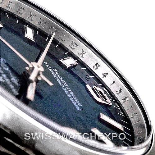 The image shows a close-up view of the dial and bezel of a Rolex Air-King 114200 Men's Stainless Steel Blue Dial 114200 Men's Stainless Steel Blue Dial watch, highlighting the hour markers and branding.