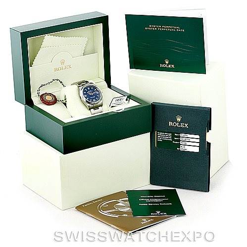 The image shows a Rolex Air-King 114200 Men's Stainless Steel Blue Dial 114200 Men's Stainless Steel Blue Dial watch with its box, tags, warranty card, manual, and other documentation from various angles.