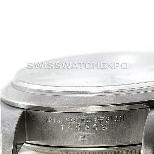 This image shows a close-up of the side of an Air-King Rolex watch, highlighting the engraving "Orig. Rolex Design 14000M".