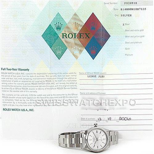 The image shows a Rolex Air-King 14000 Men's Stainless Steel Silver Dial 14000 Men's Stainless Steel Silver Dial watch placed alongside its warranty card and documentation, viewed from a front angle.