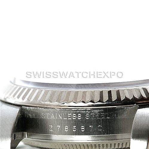 The image shows a close-up of the watch case and part of the bezel of a Rolex Air-King 114234 Men's Stainless Steel Pink Dial 114234 Men's Stainless Steel Pink Dial, highlighting the serial number and stainless steel engraving.