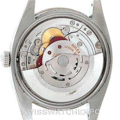 This image shows the open case back of the Rolex Air-King 114234 Men's Stainless Steel Pink Dial 114234 Men's Stainless Steel Pink Dial, revealing its internal movement and mechanisms.