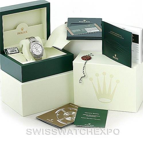 The image shows a Rolex Air-King 114200 Men's Stainless Steel Silver Dial 114200 Men's Stainless Steel Silver Dial watch with its packaging, including the inner and outer boxes, warranty card, manuals, and tags.