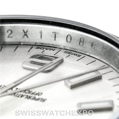 The photo shows a close-up angle of the dial and part of the bezel with the serial number of a Rolex Air-King 114200 Men's Stainless Steel Silver Dial 114200 Men's Stainless Steel Silver Dial watch.
