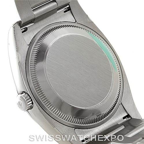 This image shows the backside and crown of a Rolex Air-King 114200 Men's Stainless Steel Silver Dial 114200 Men's Stainless Steel Silver Dial watch, including the caseback and part of the bracelet.