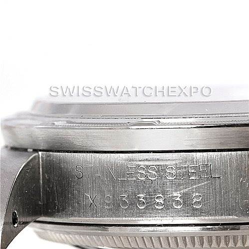 The image shows a close-up side view of a Rolex Air-King 14010 Men's Stainless Steel Blue Dial 14010 Men's Stainless Steel Blue Dial watch, focusing on the stainless steel case and visible serial number.
