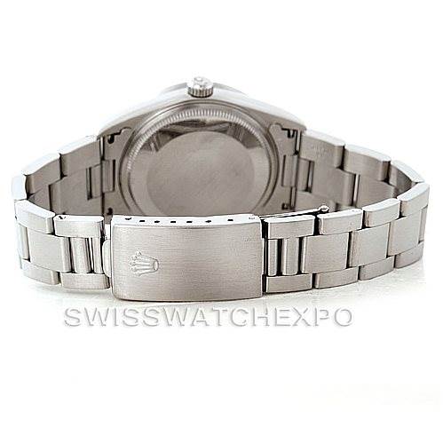 This image shows the back case and clasp of a Rolex Air-King 14010 Men's Stainless Steel Blue Dial 14010 Men's Stainless Steel Blue Dial watch from a slightly elevated angle.