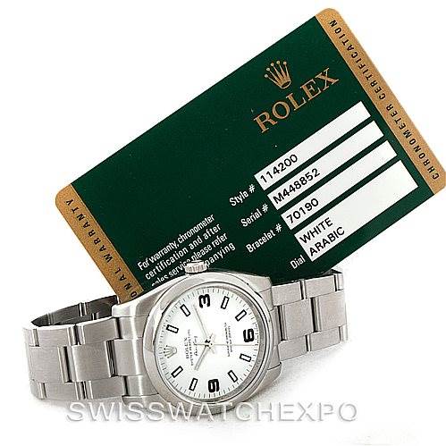 The image shows a Rolex Air-King 114200 Men's Stainless Steel White Dial 114200 Men's Stainless Steel White Dial watch and its certification card, with a front angle of the watch.