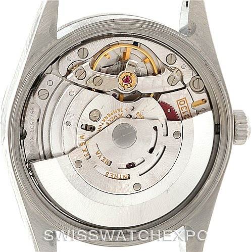 This image shows a close-up view of the movement mechanism inside a Rolex Air-King 14000 Men's Stainless Steel Blue Dial 14000 Men's Stainless Steel Blue Dial watch.