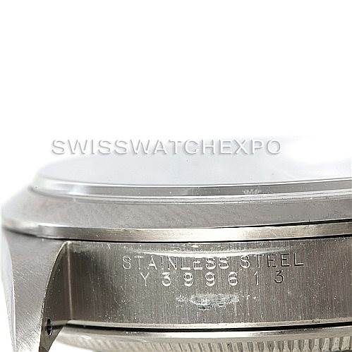 This image shows a side view of the Rolex Air-King 14000 Men's Stainless Steel Blue Dial 14000 Men's Stainless Steel Blue Dial model's case, displaying the stainless steel marking and part of the bezel.