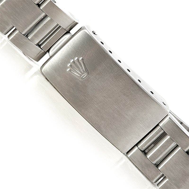 This image shows the clasp and part of the stainless steel bracelet of a Rolex Air-King 14000 Men's Stainless Steel Black Dial 14000 Men's Stainless Steel Black Dial watch, featuring the Rolex crown logo.