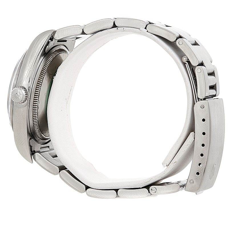 This side view of the Rolex Air-King 14000 Men's Stainless Steel Black Dial 14000 Men's Stainless Steel Black Dial watch shows the crown, bezel, and bracelet.