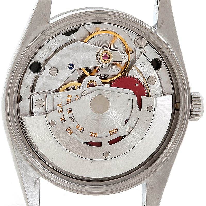 This image shows the internal movement mechanisms of the Rolex Air-King 14000 Men's Stainless Steel Black Dial 14000 Men's Stainless Steel Black Dial watch from a back angle.