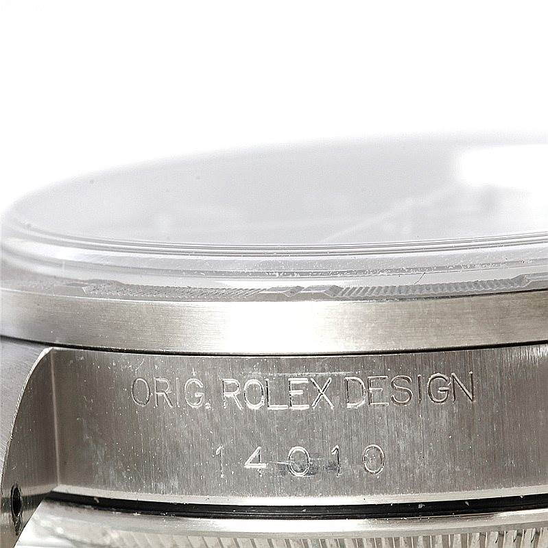 This image shows a close-up side view of the case of a Rolex Air-King 14010 Men's Stainless Steel Blue Dial 14010 Men's Stainless Steel Blue Dial watch, displaying the engraving and model number.