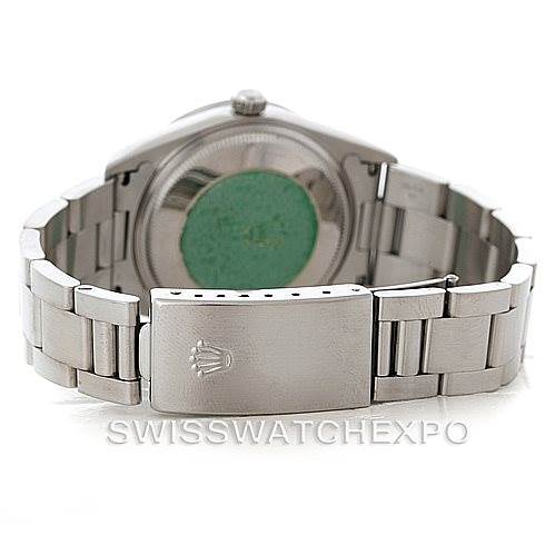The image shows the back case and clasp of a Rolex Air-King 14010 Men's Stainless Steel Blue Dial 14010 Men's Stainless Steel Blue Dial watch, with the clasp featuring the Rolex logo.