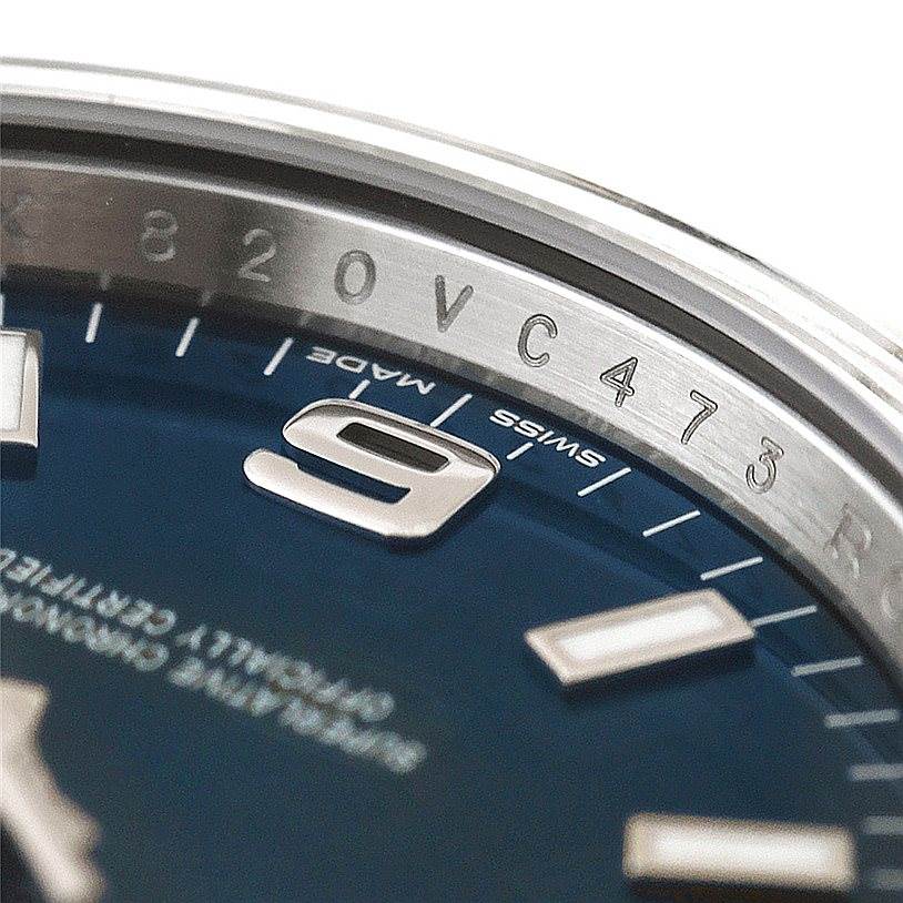This close-up image shows part of the dial, edge, and the number "5" on the Rolex Air-King 114200 Men's Stainless Steel Blue Dial 114200 Men's Stainless Steel Blue Dial watch.