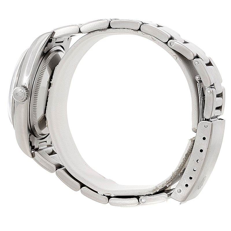 The image shows a side view of a Rolex Air-King 14000 Men's Stainless Steel Silver Dial 14000 Men's Stainless Steel Silver Dial watch, highlighting the band, crown, and clasp.