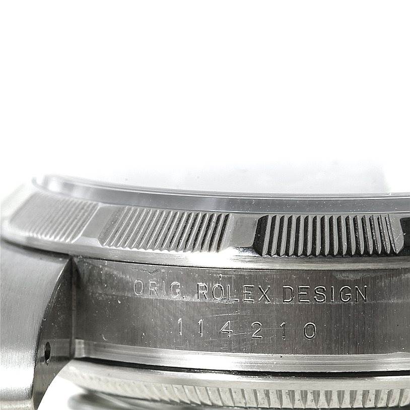 The image shows a close-up side view of the casing and part of the bezel of a Rolex Air-King 114210 Men's Stainless Steel Blue Dial 114210 Men's Stainless Steel Blue Dial watch, including model number 114210.