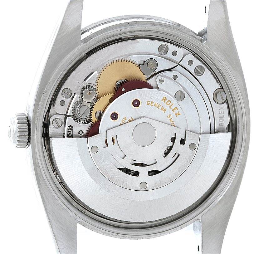 This image shows the internal mechanical movement of a Rolex Air-King 114210 Men's Stainless Steel Blue Dial 114210 Men's Stainless Steel Blue Dial watch from the back view.