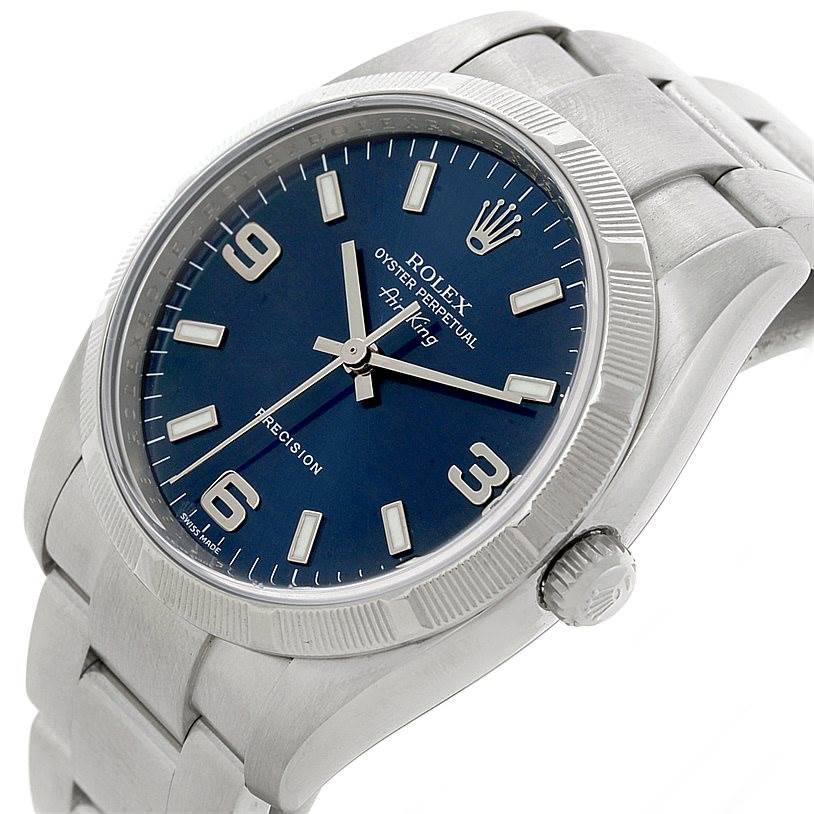 The Rolex Air-King 114210 Men's Stainless Steel Blue Dial 114210 Men's Stainless Steel Blue Dial watch is shown from a front angle, displaying its blue dial, bezel, case, and part of the bracelet.
