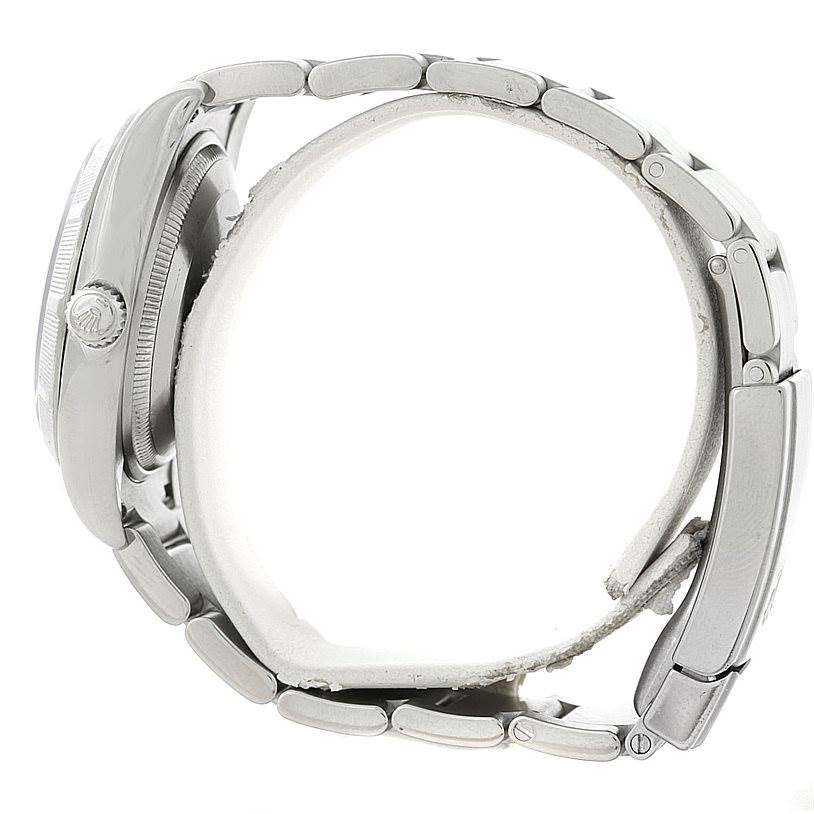 The image shows a Rolex Air-King 114210 Men's Stainless Steel Blue Dial 114210 Men's Stainless Steel Blue Dial watch from a side angle, highlighting the crown, case, and part of the bracelet.