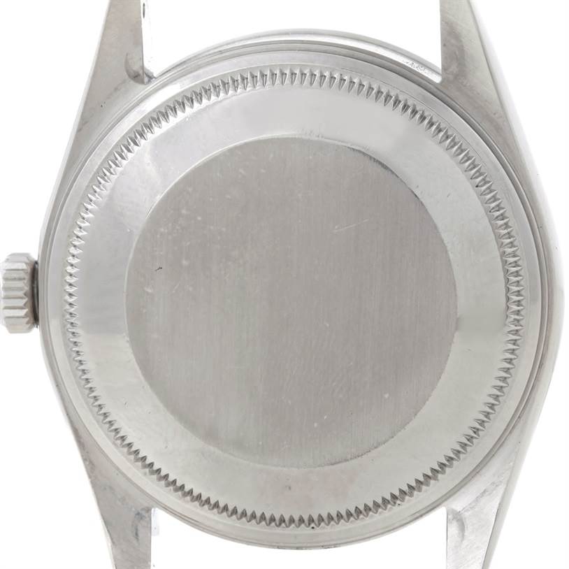 The image shows the backside of a Rolex Air-King 14000 Men's Stainless Steel White Dial 14000 Men's Stainless Steel White Dial watch case, focusing on the case back and crown.
