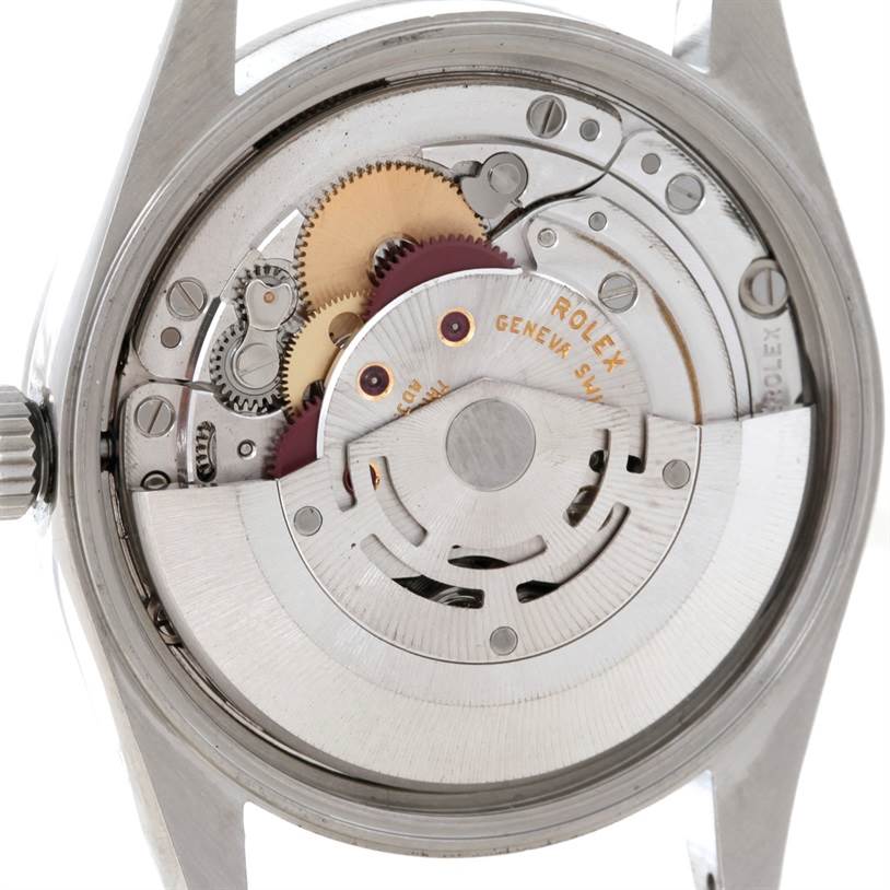 The image shows the movement and inner mechanisms of the Rolex Air-King 14000 Men's Stainless Steel Blue Dial 14000 Men's Stainless Steel Blue Dial watch from a rear angle.