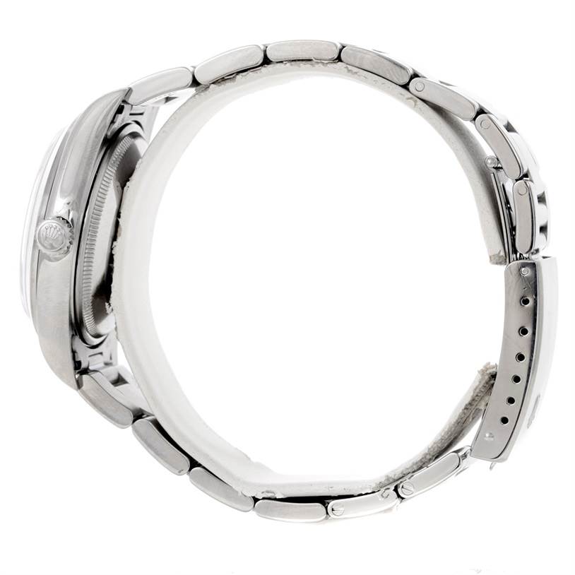 This image shows a side view of the Rolex Air-King 14000 Men's Stainless Steel Silver Dial 14000 Men's Stainless Steel Silver Dial watch, highlighting the bracelet and crown.