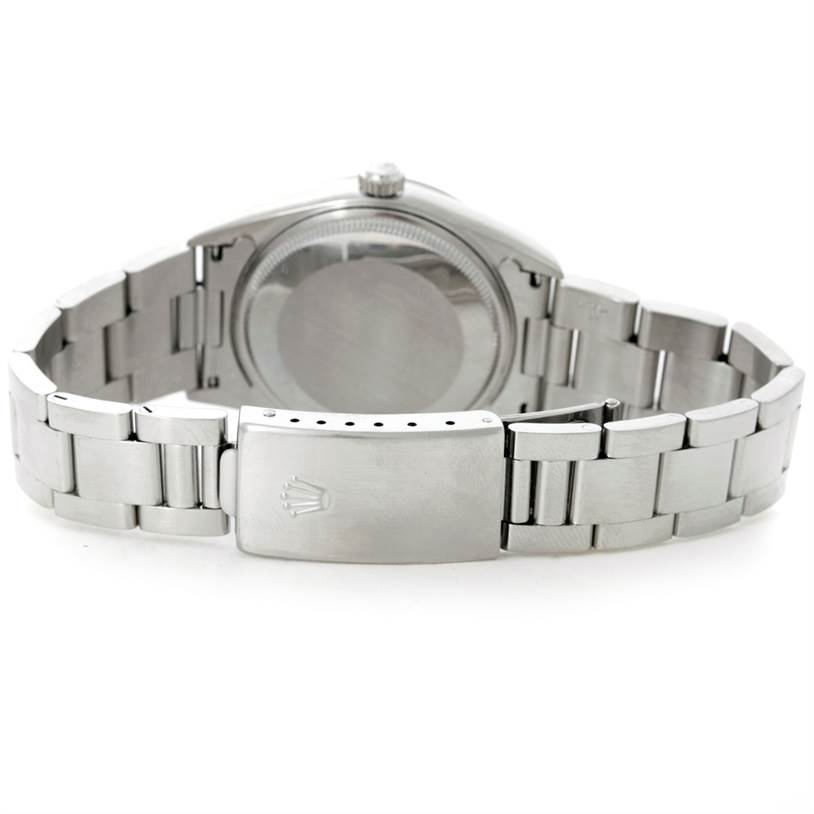 This image shows the back view of a Rolex Air-King 14000 Men's Stainless Steel Silver Dial 14000 Men's Stainless Steel Silver Dial watch, focusing on the case back and clasp.