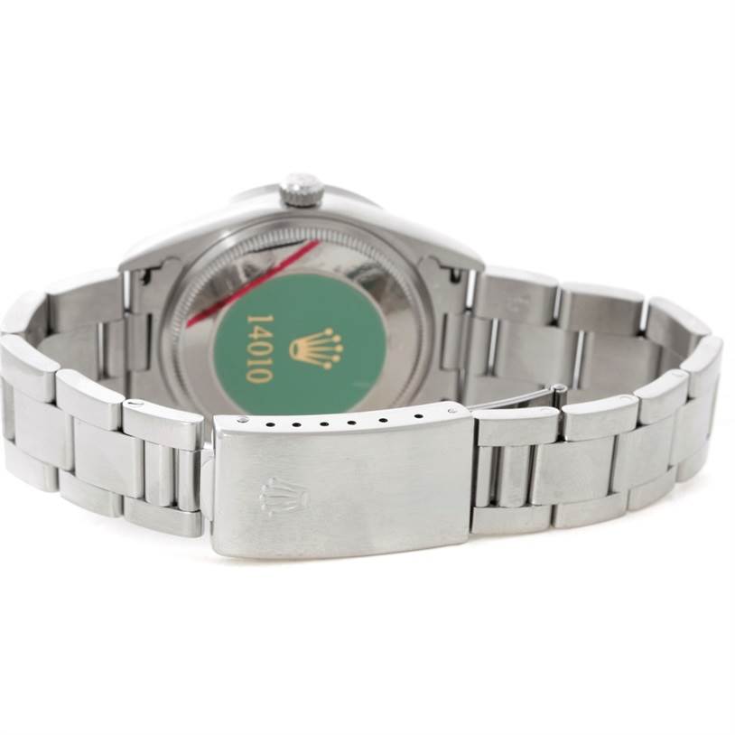 This image shows the back and stainless steel bracelet of a Rolex Air-King 14010 Men's Stainless Steel Pink Dial 14010 Men's Stainless Steel Pink Dial watch, model 14010.