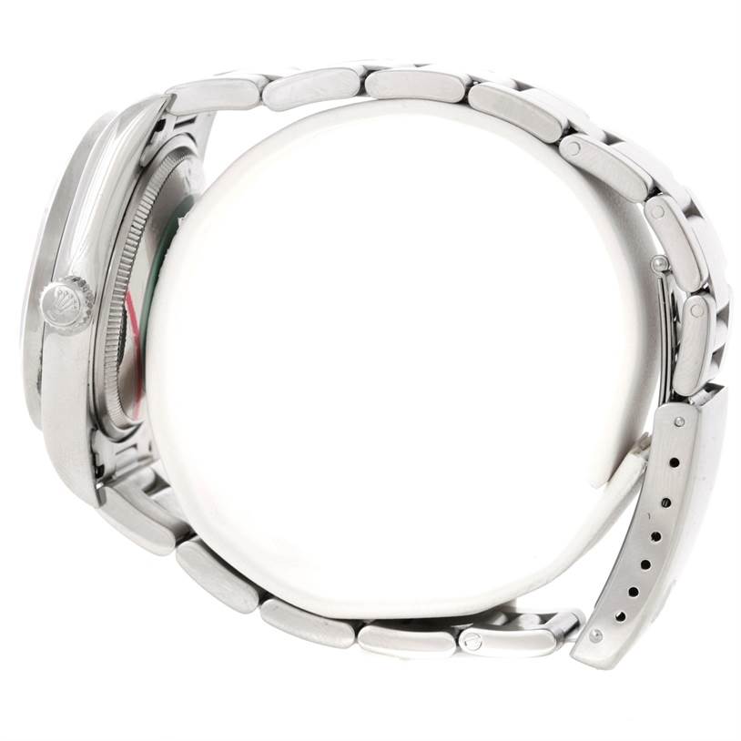 The image shows a side view of a Rolex Air-King 14010 Men's Stainless Steel Pink Dial 14010 Men's Stainless Steel Pink Dial watch, highlighting the watch case, crown, and metal bracelet.