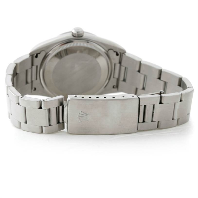 This image shows the back case and clasp of the bracelet on a Rolex Air-King 14000 Men's Stainless Steel White Dial 14000 Men's Stainless Steel White Dial watch.