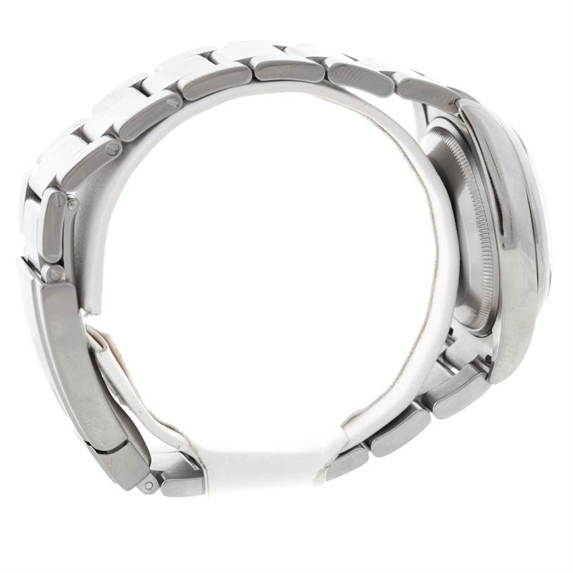 Side view of a Rolex Air-King 114200 Men's Stainless Steel Blue Dial 114200 Men's Stainless Steel Blue Dial watch showcasing the stainless steel bracelet and partially obscured case back.