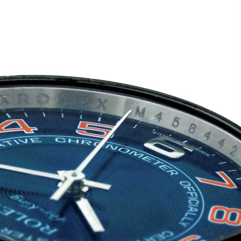 This close-up of a Rolex Air-King 114200 Men's Stainless Steel Blue Dial 114200 Men's Stainless Steel Blue Dial watch shows the dial, numerals, and part of the minute hand.