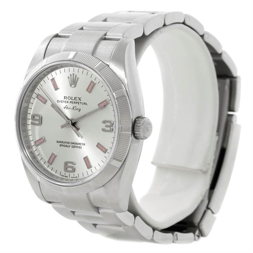 The Rolex Air-King 114200 Men's Stainless Steel Silver Dial 114200 Men's Stainless Steel Silver Dial watch is shown at an angled view, displaying the face, bezel, crown, and part of the bracelet.