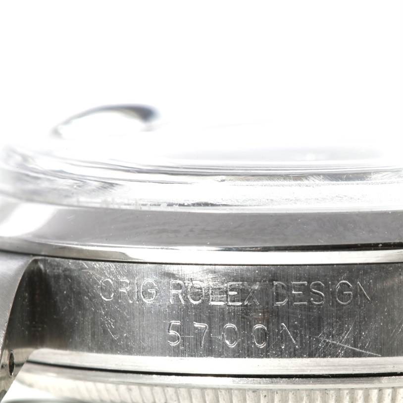 This close-up image shows the side engraving of the bezel and case on a Rolex Air-King 5700 Men's Stainless Steel Black Dial 5700 Men's Stainless Steel Black Dial watch.